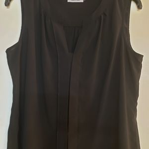 Black sleeveless blouse
